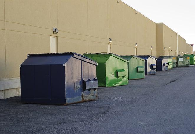 large construction waste containers in a row at a job site in Cohutta